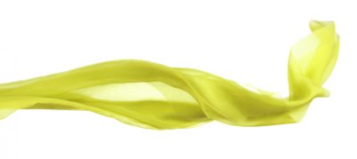 A sheer yellow scarf against a white background