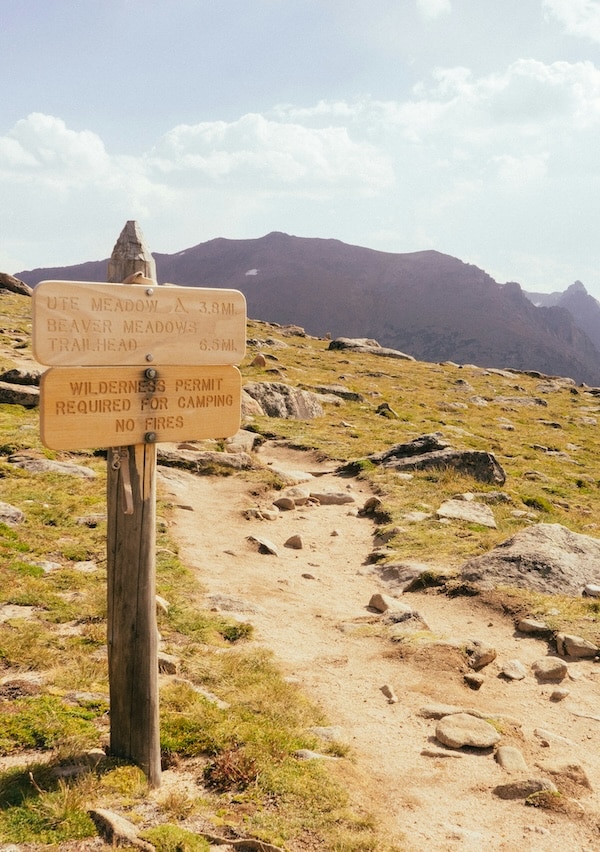 Picture of mountain trail hike with sign